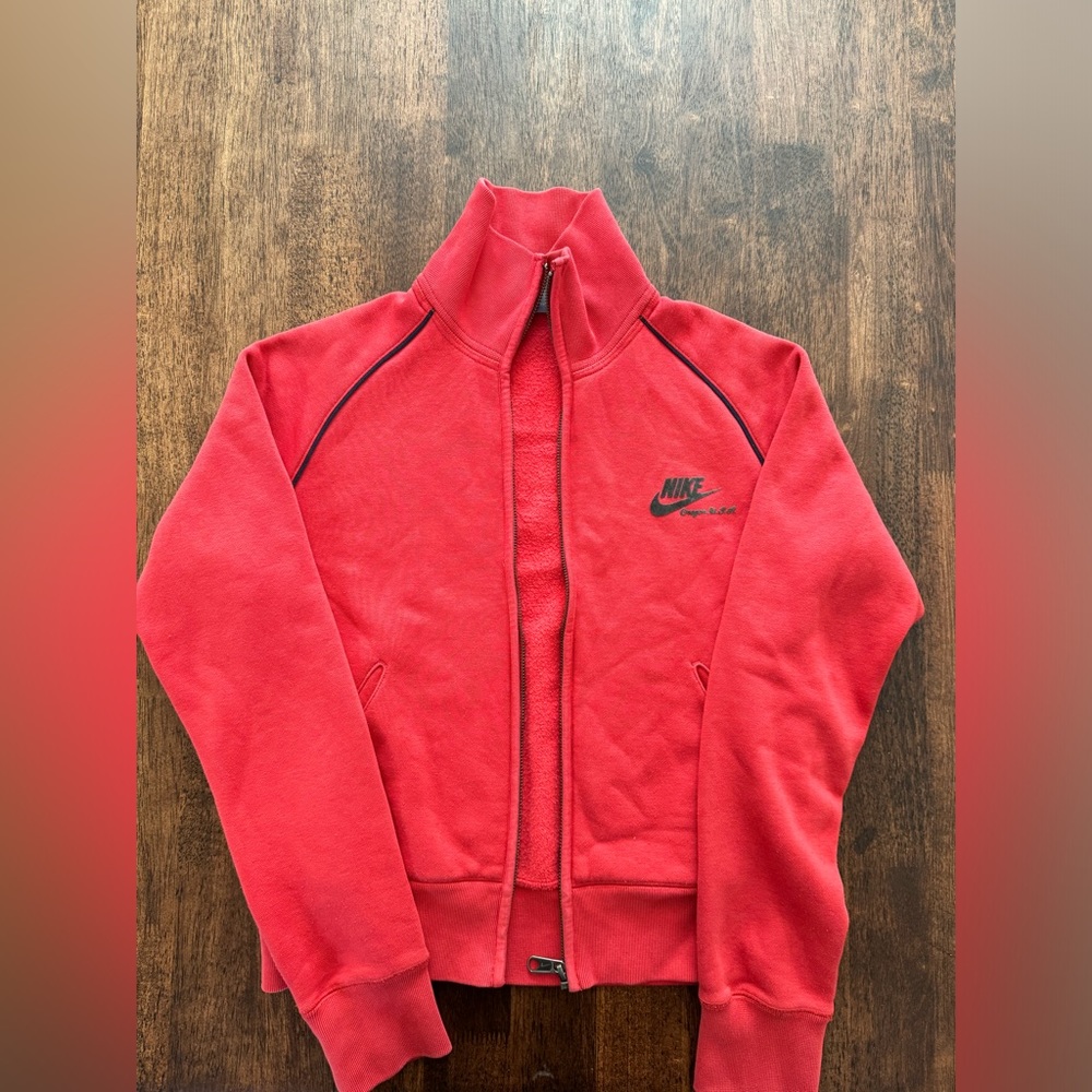 Red Property of Nike Zip Up size large (youth)